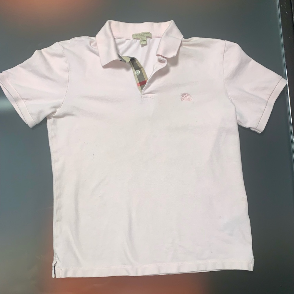 Men’s pink Burberry polo.